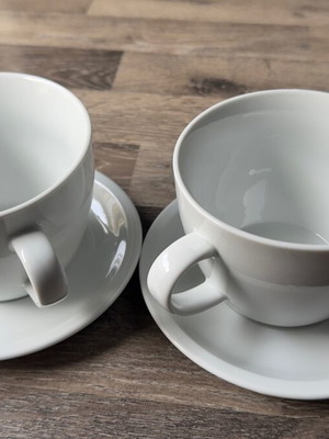 Set of 2 white coffee cups with saucers like new, minimal design