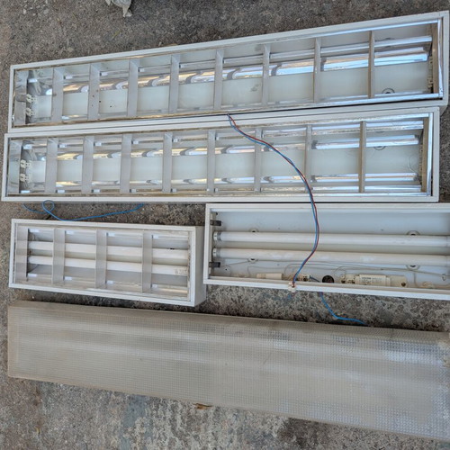 Fluorescent lamp fixtures with transformers and starters