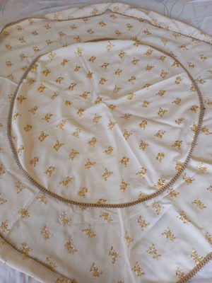 Table linens used, round tablecloth and rectangular runner