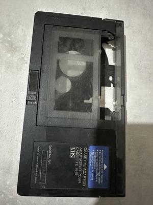 VHS-C to VHS cassette adapter