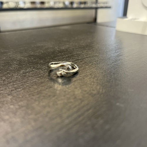 Steel ring silver color adjustable size with hands design like new