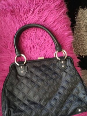 Vintage Famous Stars and Straps bag like new, collectible