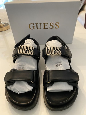 Πέδιλα Guess καινούργια, μαύρα και χρυσαφί, πλατφόρμες, νούμερο 39