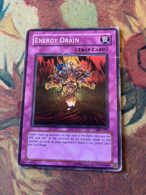Energy Drain Trap YuGiOh Card used, heavy played