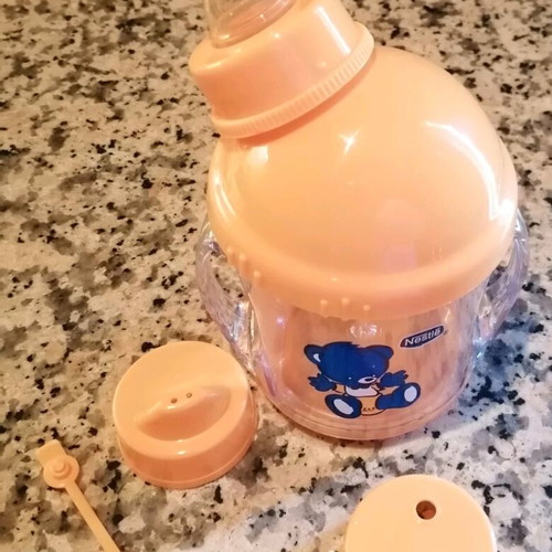 Nestlé baby cup with handles and four spouts new