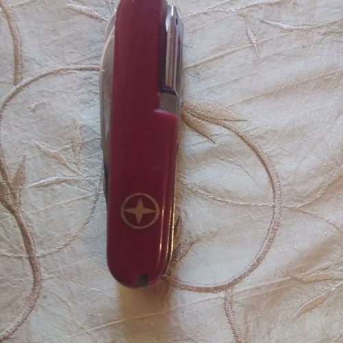 Multitool pocket knife like new with saws, screwdriver, scissors, and more