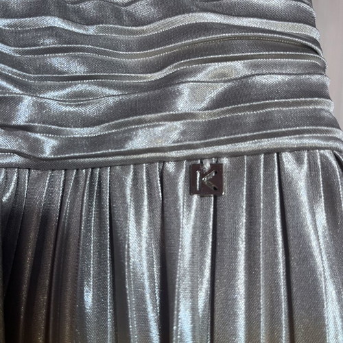 Kocca maxi metallic dress with pleated design and crossover neckline