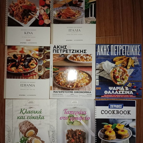 Set of 8 cookbooks new, hardcover from newspapers