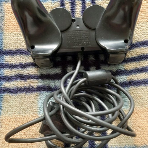 PlayStation 2 original controller used with good analog sticks