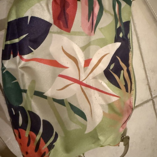 Caprisa shoulder bag used with floral inner pouch, white