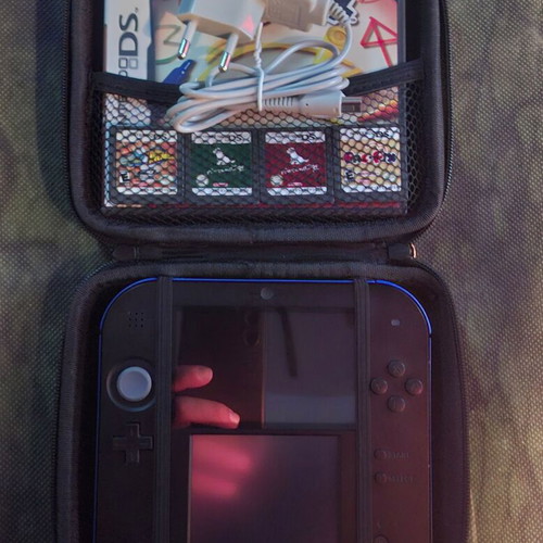 Nintendo 2DS used with 4 games, case and charger