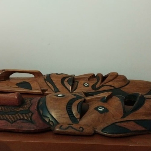 Pair of large handmade African masks from solid wood like new