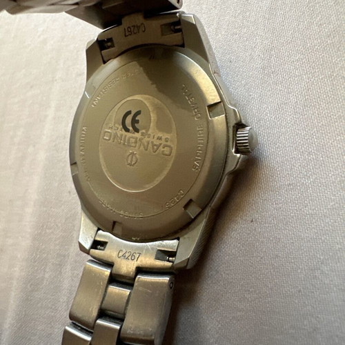 Candino Swiss watch titanium with blue dial and silver bracelet like new