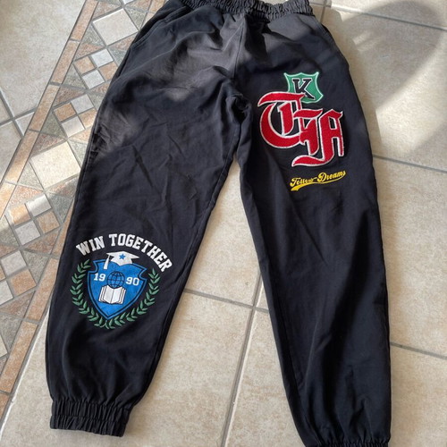 Bershka pants used, black with multicolor designs, XS