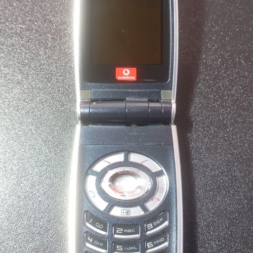 Sharp GX25 used clamshell mobile phone
