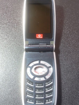 Sharp GX25 used clamshell mobile phone