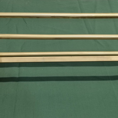 Brass wall-mounted hanger used