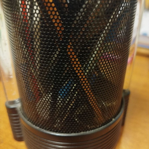 Pen holder with built-in electronic clock used