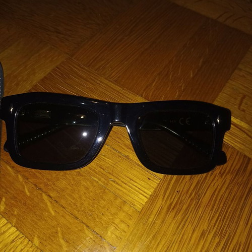 Epos sunglasses new with leather case, black lenses