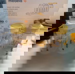Medela swing pump with extra parts