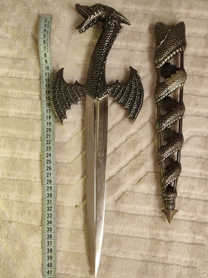 Decorative fantasy dagger with dragon design and original sheath like new