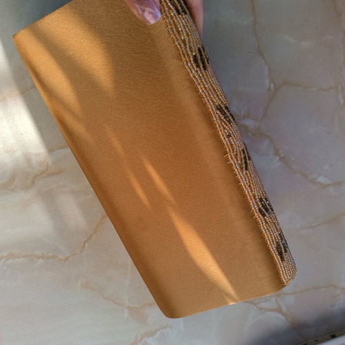 Gold beaded hand bag like new