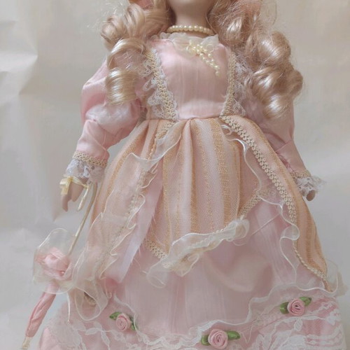 Porcelain dolls used, set of 2 with clothes and accessories