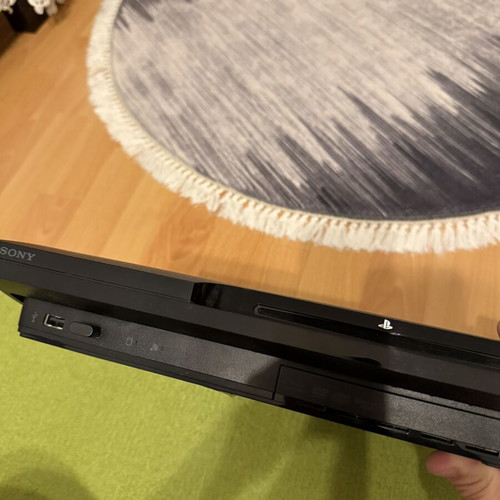 Sony PlayStation 3 Slim 320GB console used with 2 controllers and cables