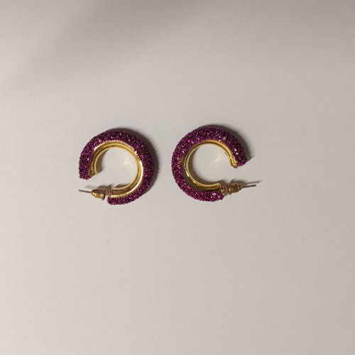 Chunky gold hoop earrings with purple rhinestones, used