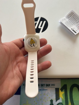 Electronic wristwatch new, white, analog