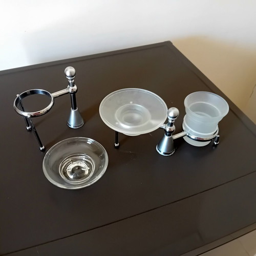 Two sets of inox bathroom accessories with glass and frosted parts