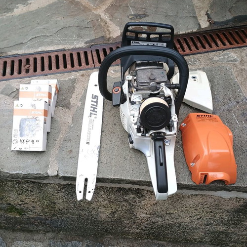 Stihl MS 251 chainsaw like new with three chains