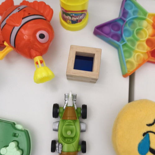 Various toys used, bubble bottle empty