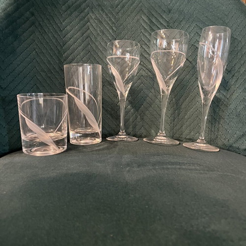 Crystal glass set of 60 with hand-carved design