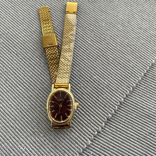 Vintage watch with burgundy dial and yellow strap women's new