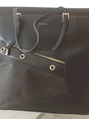 Duki Daso shoulder bag like new, black with gold details