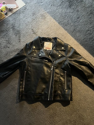 Black biker jacket synthetic leather