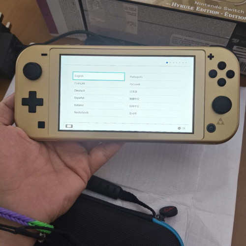 Nintendo Switch Lite Hyrule Edition with protective case