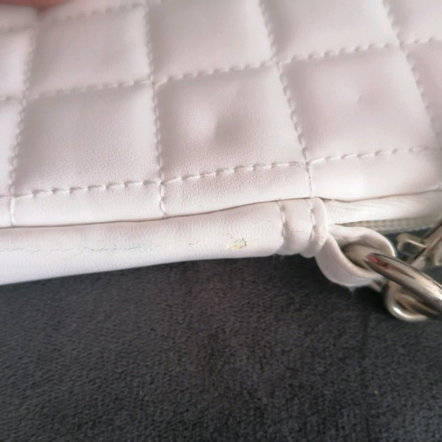 Tablet bag with slight wear on strap