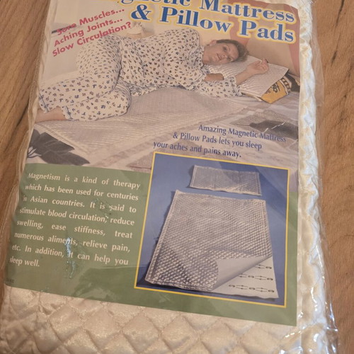 Magnetic mattress and pillow pads for pain relief