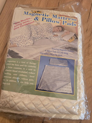 Magnetic mattress and pillow pads for pain relief