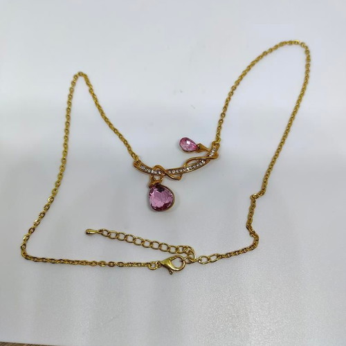 Pendant with pink crystals and gold chain like new