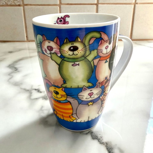Large porcelain mug with cat design like new