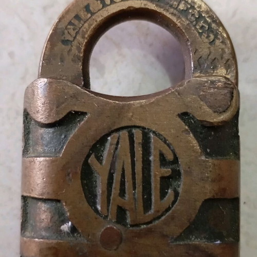 Yale padlock used, vintage possibly 1920-1930 with wear and patina