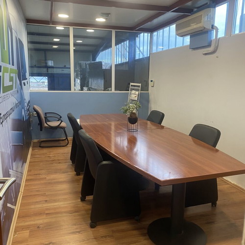 Meeting Table and 3 Desks used, including a large corner desk