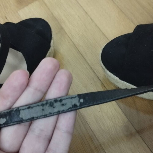 Black platform shoes used with strap wear, size 39