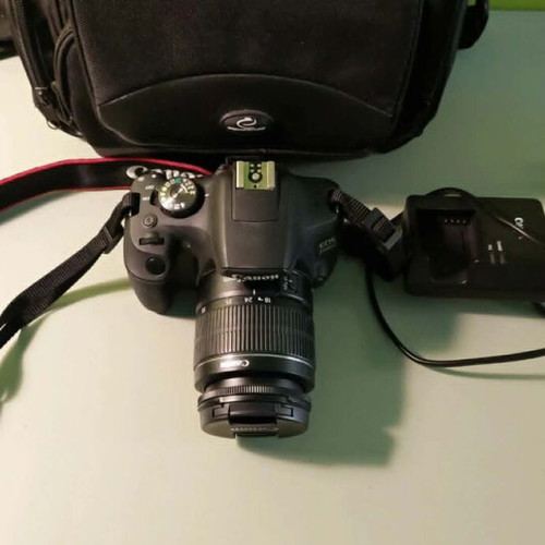 Canon EOS 2000D camera with 18-55mm lens like new and carrying bag