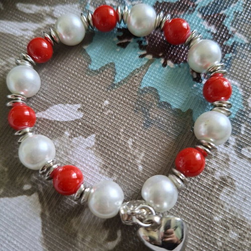 Bracelet with red and white faux pearls and heart pendant used