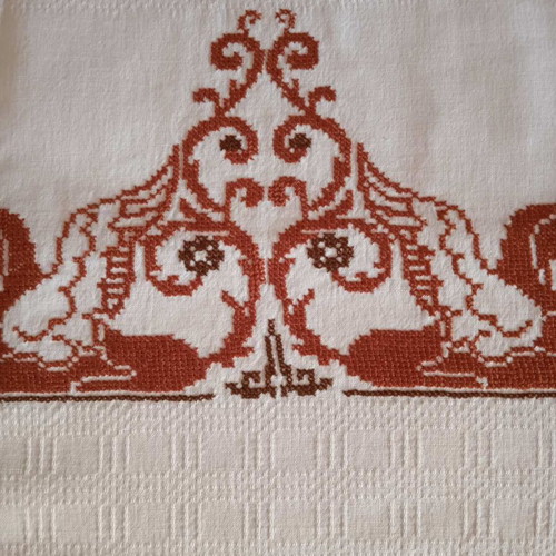 Handmade white embroidered table runner tzevres in terracotta-brown shades