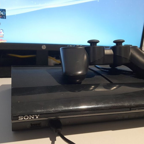 PlayStation 3 PS3 500GB Super Slim with Custom Software and Many Games